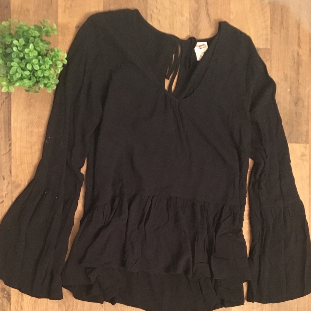 Trendy and breezy peplum top with bell sleeves!